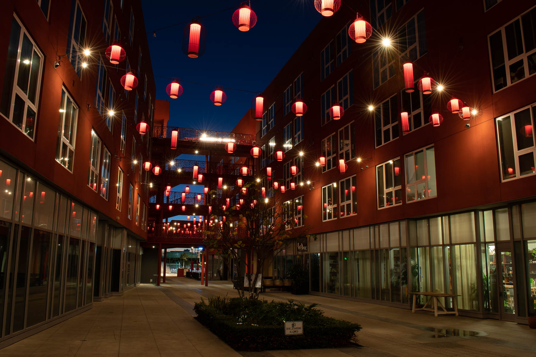 Retail space - buildings and pathway at night with lights